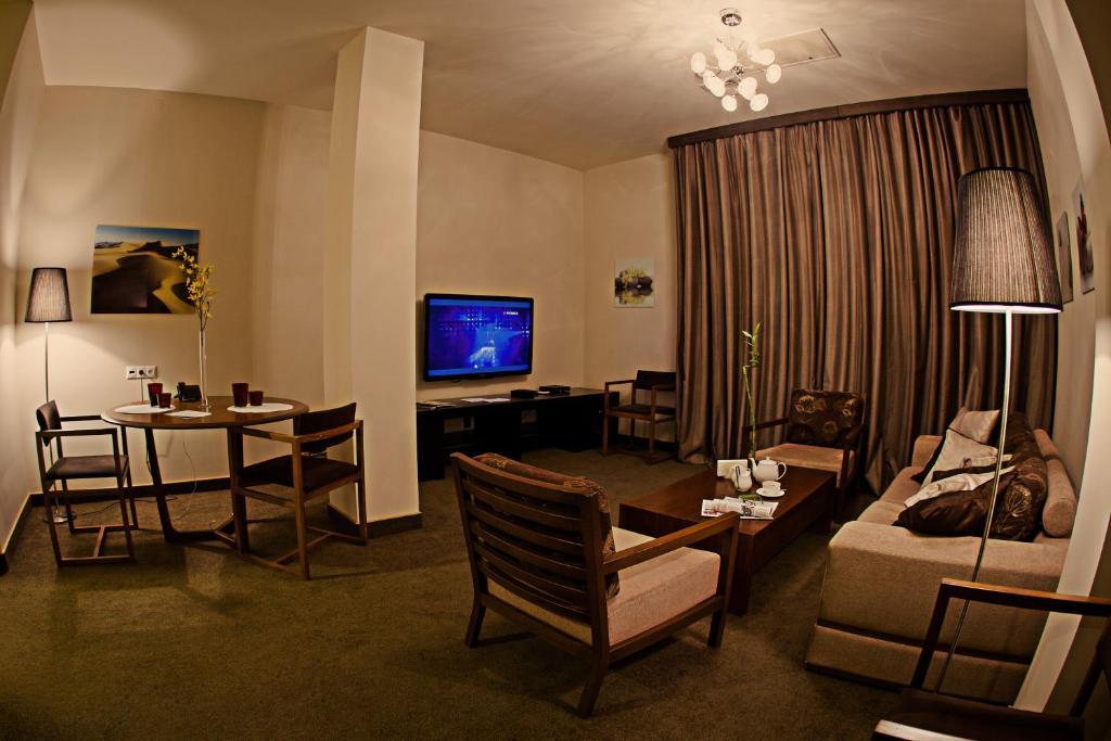 Voyage Hotel Karagandy Habitación foto